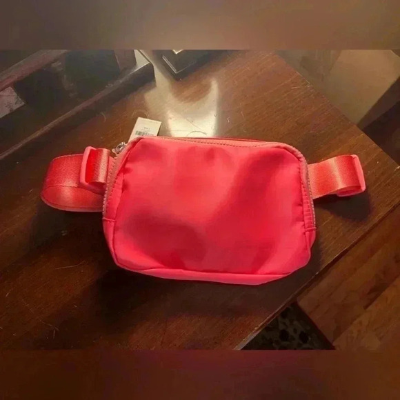 Francesca's Collections Accessories - Francesca’s Neon Coral Cross Fanny NWT
